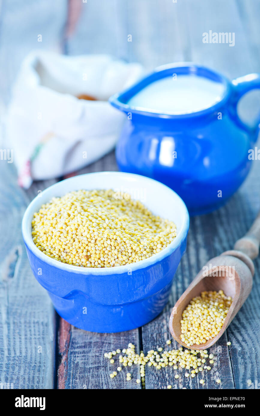 millet porridge in bowl and on a table Stock Photo Alamy