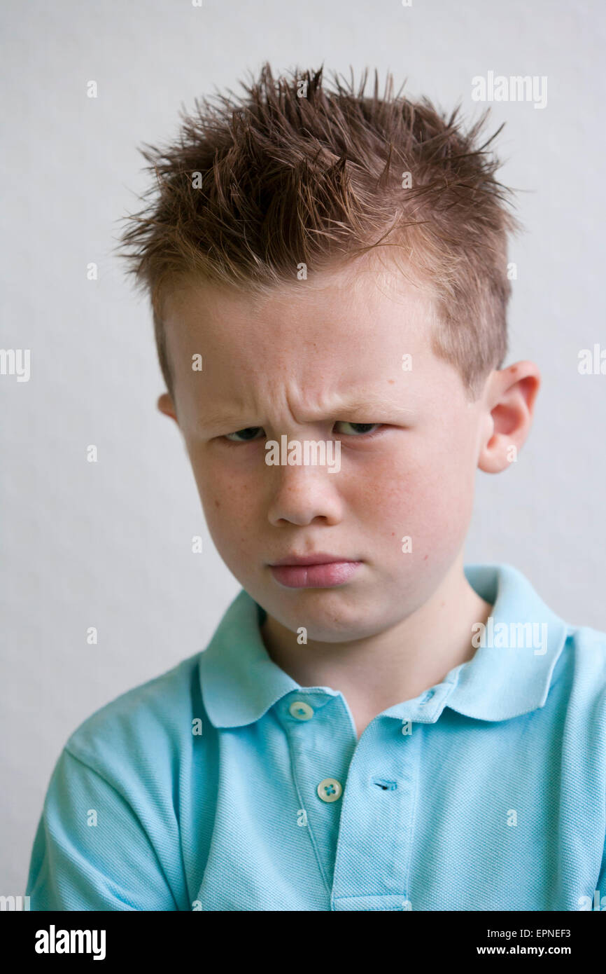 Portrait Of An Irritated Eight Year Old Boy Stock Photo 82836295