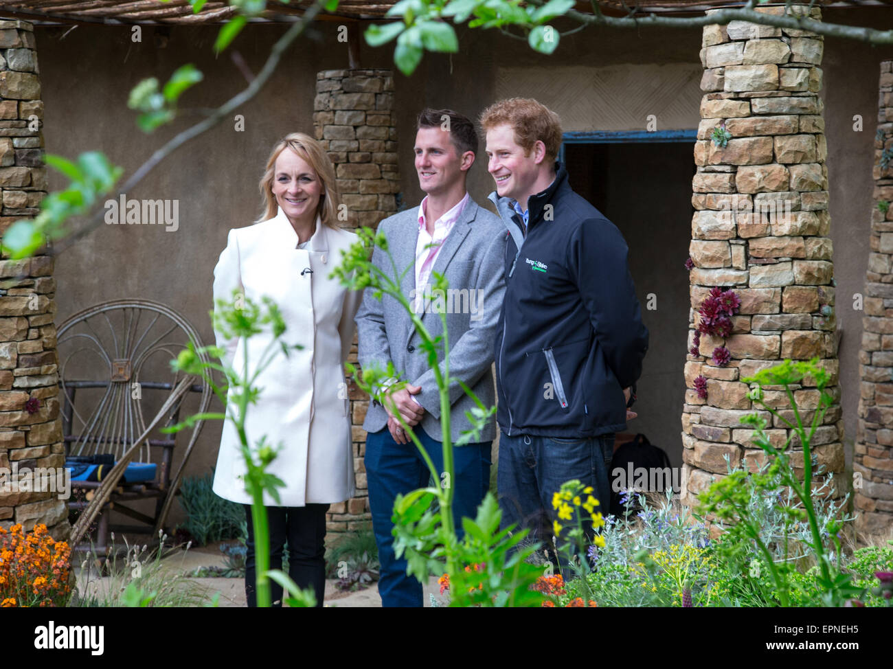 HRH Prince Harry at the 'Sentebale - Hope in Vulnerability' garden at RHS Chelsea  with Matt Keightley and Louise Minchin. Stock Photo