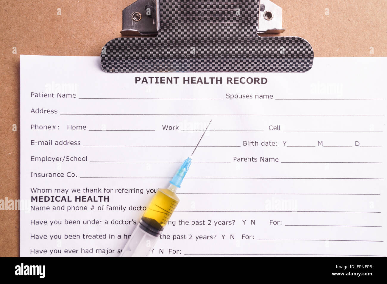 Medical Chart and Syringe with yellow fluid Stock Photo Alamy