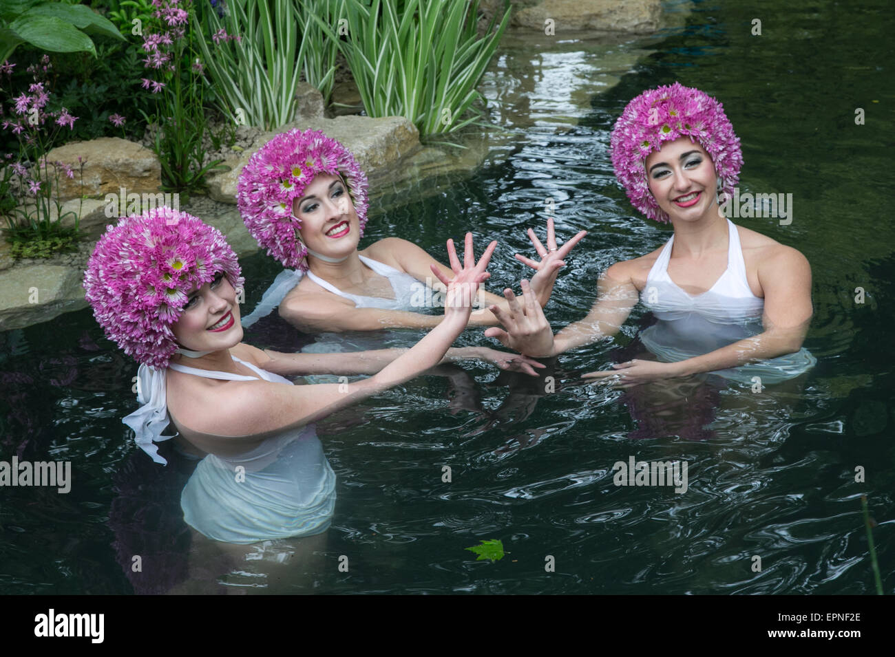 British Olympian Katie Clark, braved the rain at this year's Chelsea Flower Show to take a dip in a show-garden pond. Stock Photo