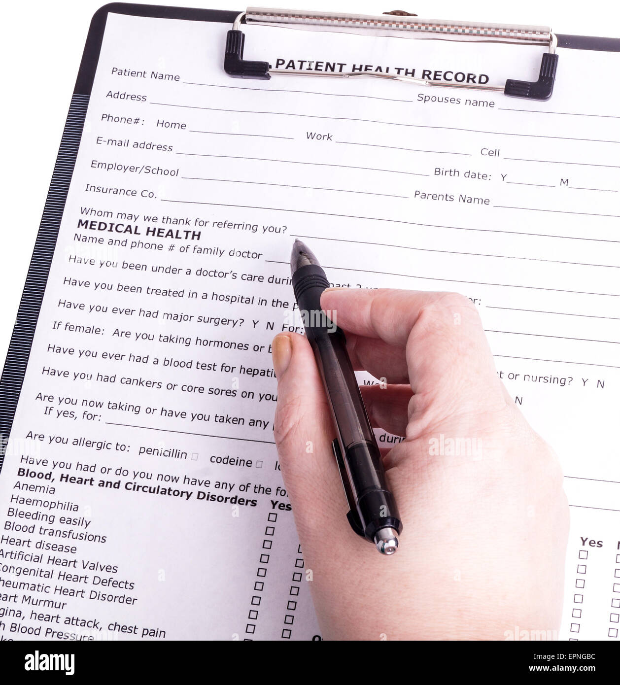 Health care person  fills patient registration prior to admission and examination. The doctor is thorough in completing properly Stock Photo