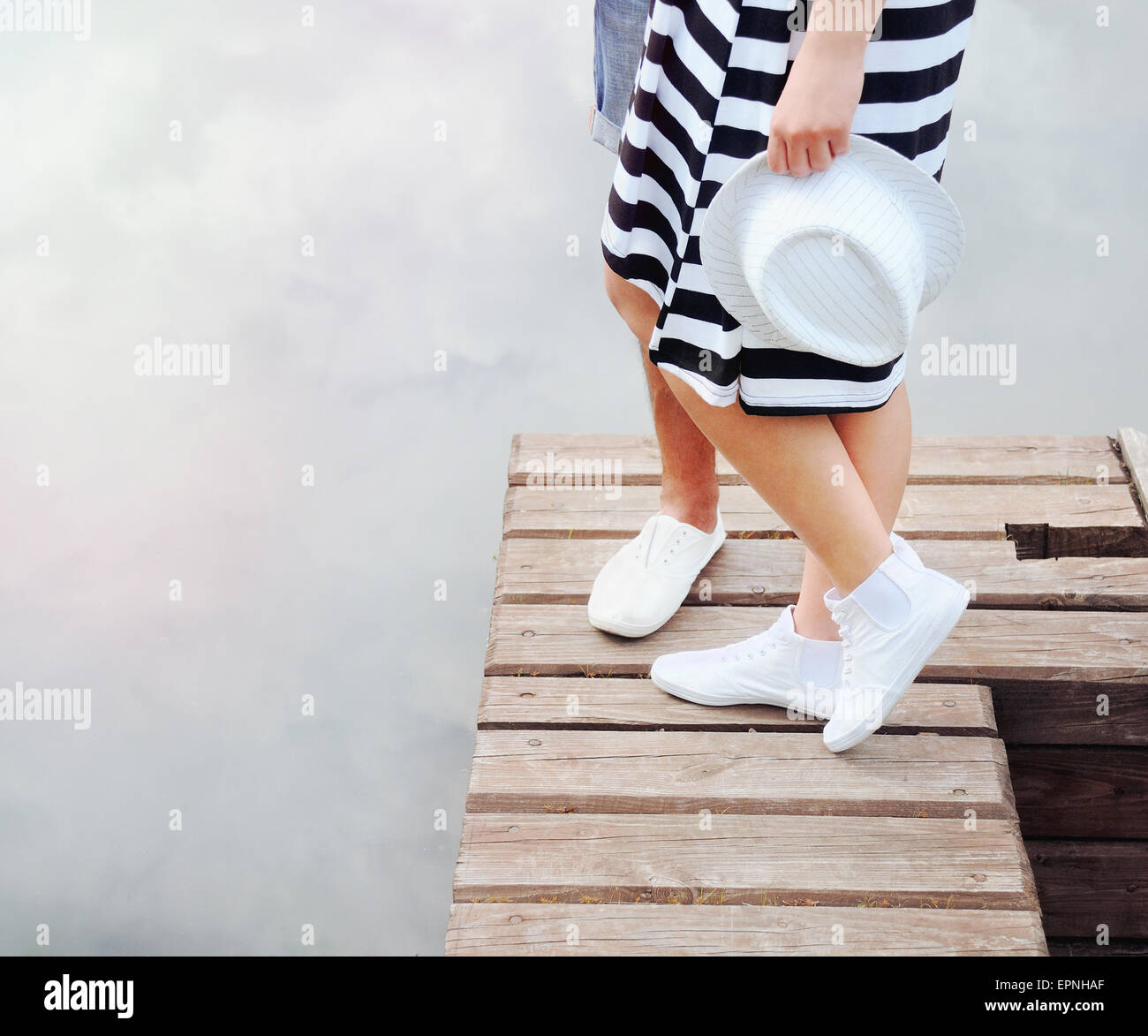 Photo inspiration: Couple Kissing On The Pier Near Lake In Hot Summer Photo Inspiration