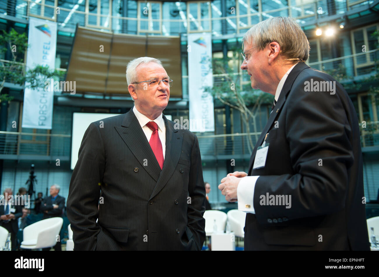 Berlin, Germany. 20th May, 2015. Martin Winterkorn (L), CEO of Volkswagen AG, and Joerg Hacker, President of the German National Academy of Sciences Leopoldina, converse at the 'Research Summit 2015 - Perspectives for Economy, Science, and Innovation' in Berlin, Germany, 2015. At the Research Summit 2015 around 300 leaders and experts in economy, science, politics, and society search for strategies in order to proceed with research and innovation despite the pressure of rising costs. Credit:  dpa picture alliance/Alamy Live News Stock Photo