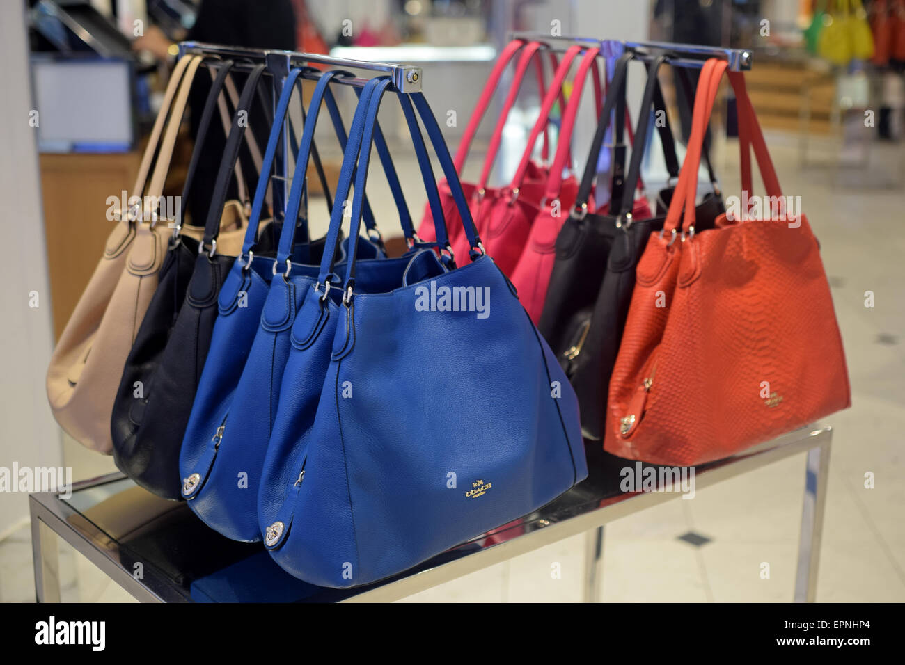 A colorful selection of Coach leather handbags at Macy's at Herald Stock  Photo - Alamy