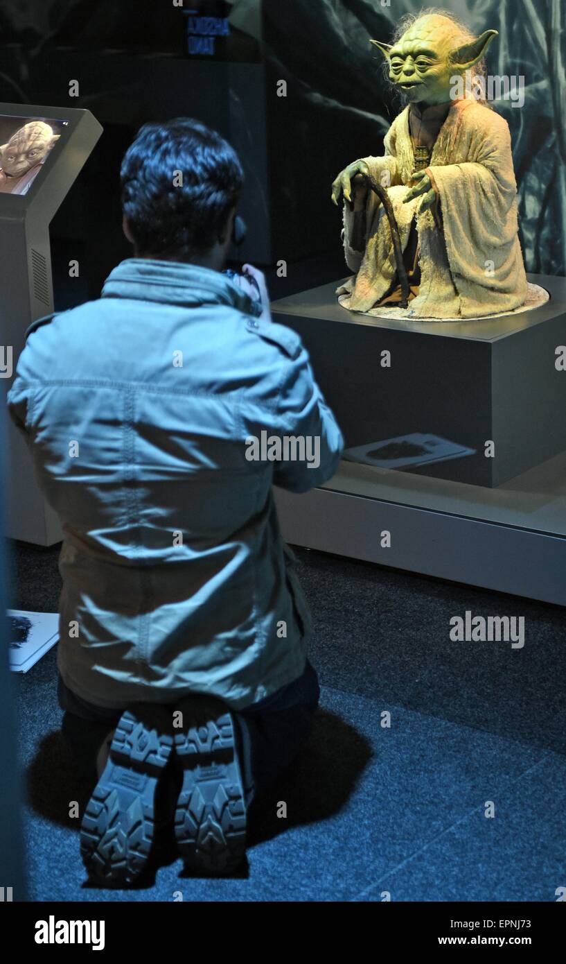 Cologne, Germany. 20th May, 2015. The film character 'Master Yoda' can be seen during a press tour in the exhibition 'Star Wars Identities' in the Odysseum in Cologne, Germany, 20 May 2015. Original costumes, masks, and props from the Star Wars films are on display in the exhibition. Credit:  dpa picture alliance/Alamy Live News Stock Photo