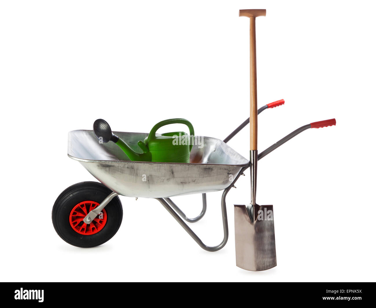 Wheelbarrow and gardening tools isolated on white Stock Photo
