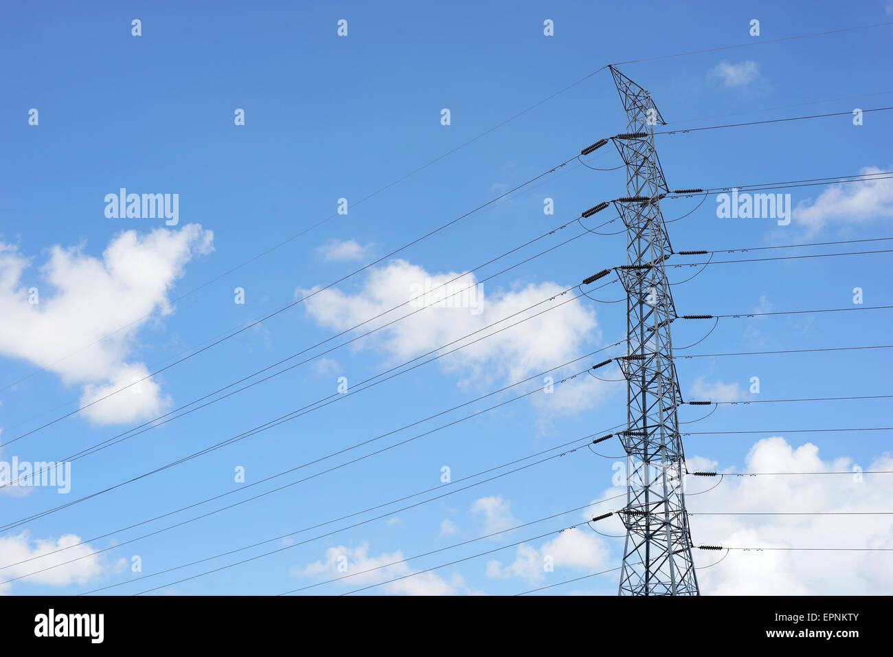 High voltage electric tower on sky background Stock Photo - Alamy