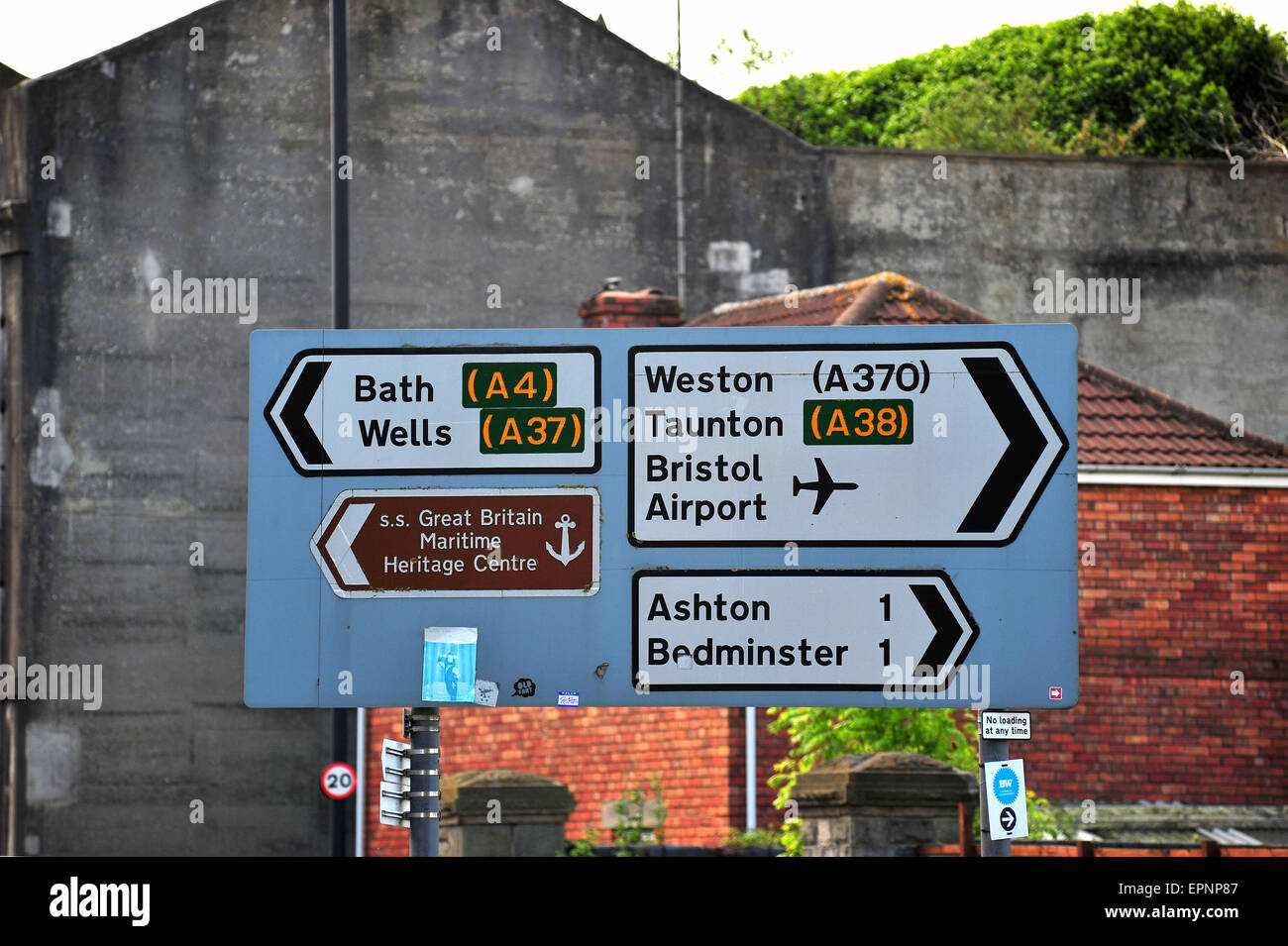 A road sign in Bristol directing traffic to Bath and Wells or Weston, Taunton and Bristol Airport. Stock Photo