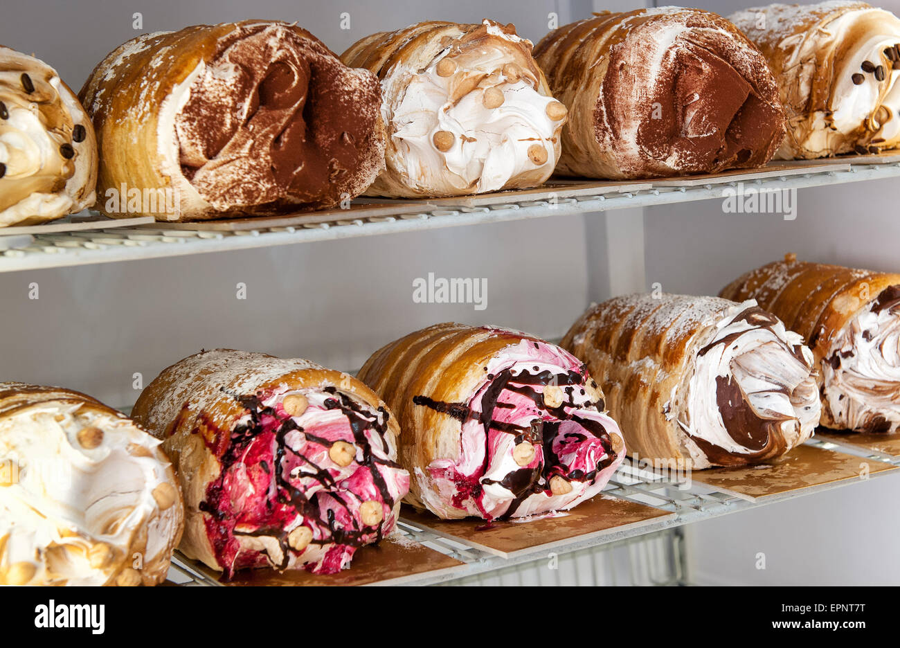Gourmet Italian semifreddo desserts in a refrigerator made with semi-frozen ice cream and whipped cream in a parfait mousse in a Stock Photo