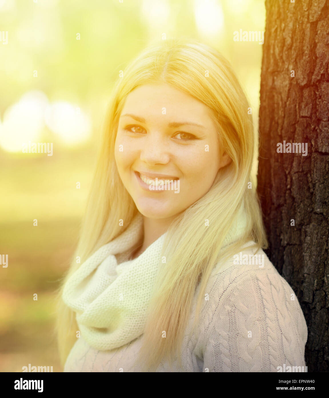 Portrait of happy girl with blonde hair outdoors Stock Photo - Alamy