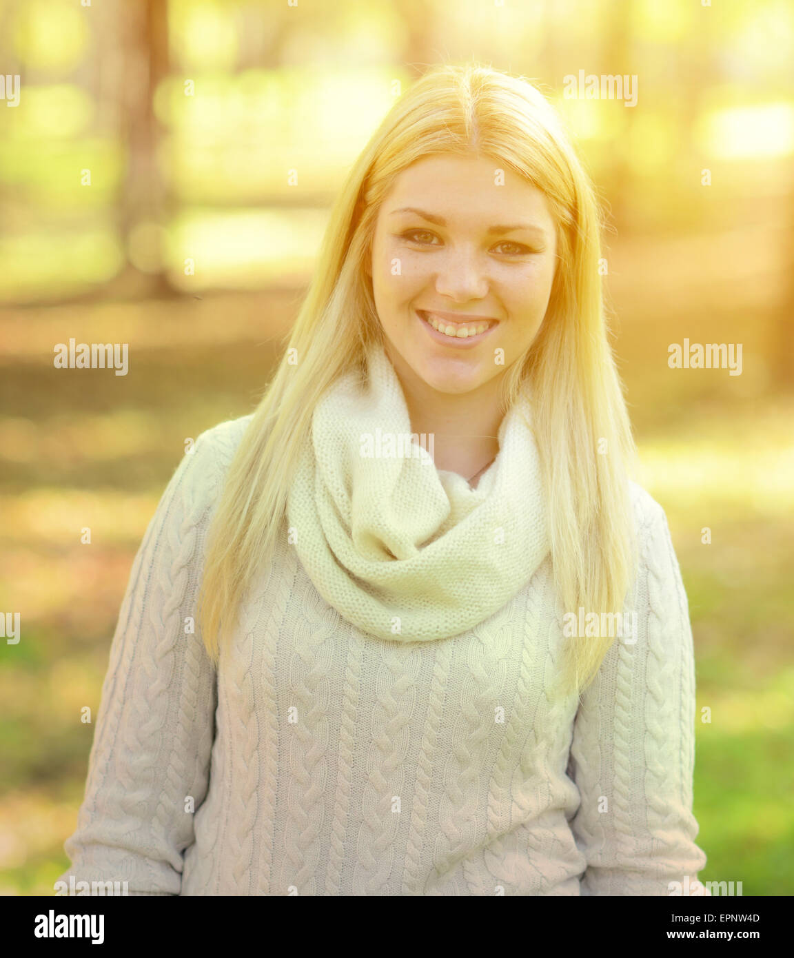 Portrait of happy girl with blonde hair outdoors Stock Photo - Alamy