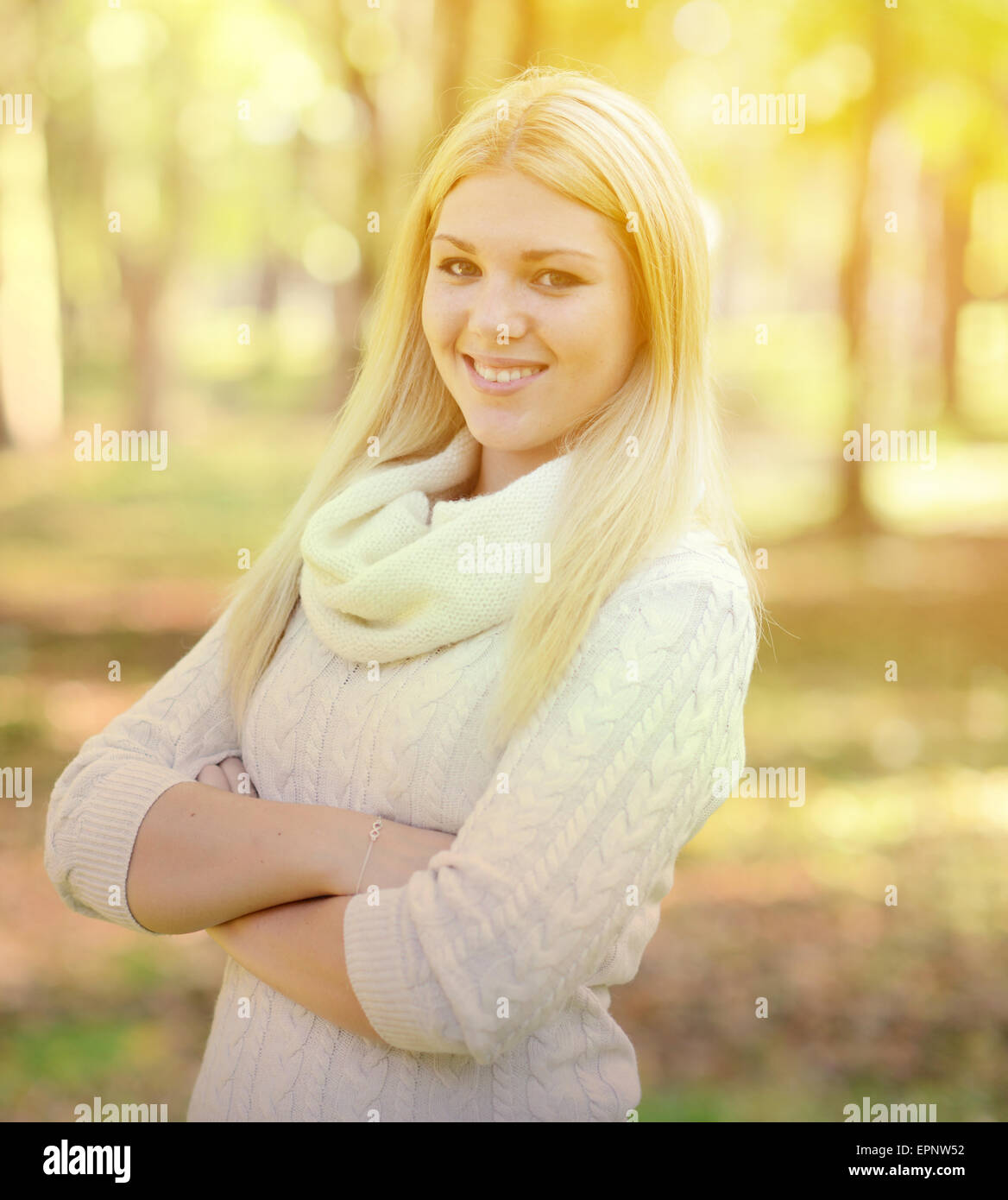 Portrait of happy girl with blonde hair outdoors Stock Photo - Alamy