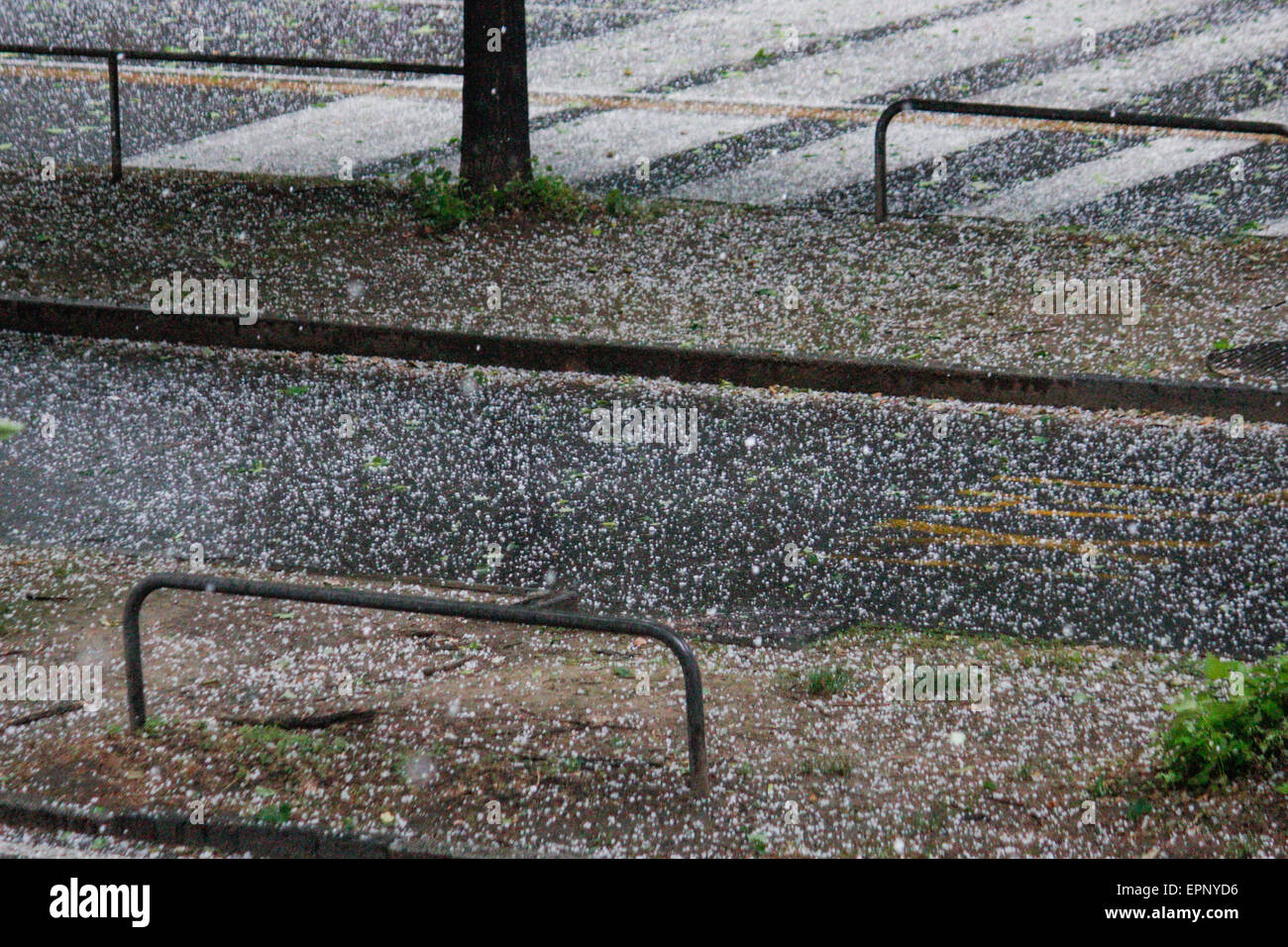 Turin, Italy. 20th May, 2015. The hailstorm covered with a white blanket the road. © Elena Aquila/Pacific Press/Alamy Live News Stock Photo