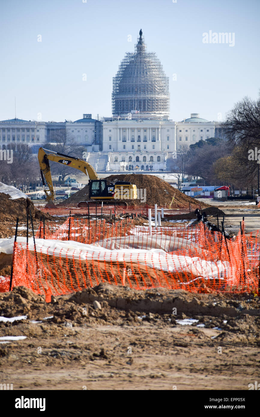 WASHINGTON DC, USA - Renovations on a section of the eastern end of the National Mall in Washington DC, with the dome of the U.S. Capitol Building in the background covered in scaffolding as it undergoes its own repairs. Stock Photo