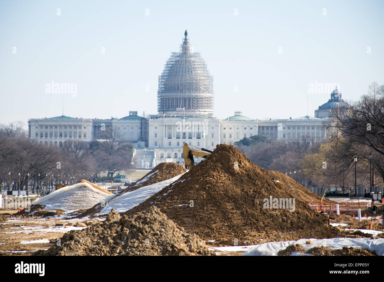 WASHINGTON DC, USA - Renovations on a section of the eastern end of the National Mall in Washington DC, with the dome of the U.S. Capitol Building in the background covered in scaffolding as it undergoes its own repairs. Stock Photo