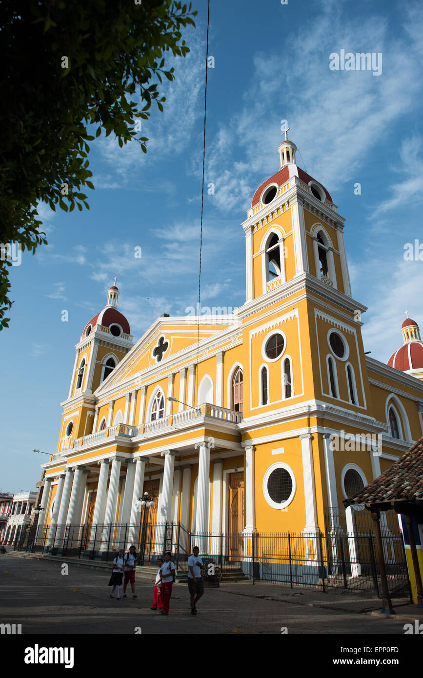 GRANADA, Nicaragua — The Cathedral of Granada, also known as Our Lady of the Assumption (La Asunción), is a significant historical and religious landmark in Granada, Nicaragua. Situated near Parque Colón and Plaza de la Independencia, the cathedral is a prime example of Spanish colonial architecture in Central America. Stock Photo