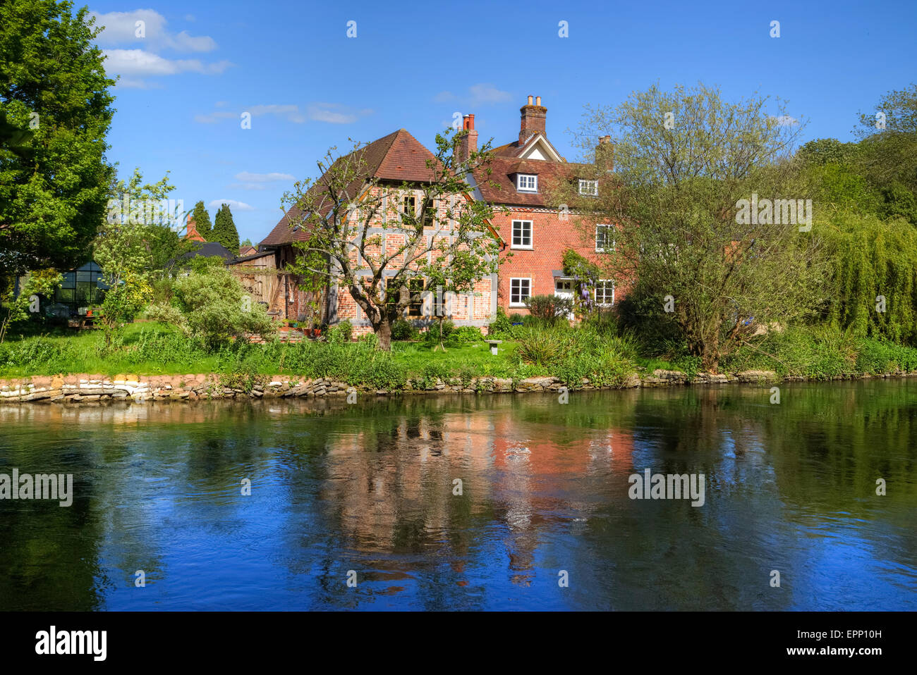 cottages at the river Test in Romsey, Hampshire, England, UK Stock Photo