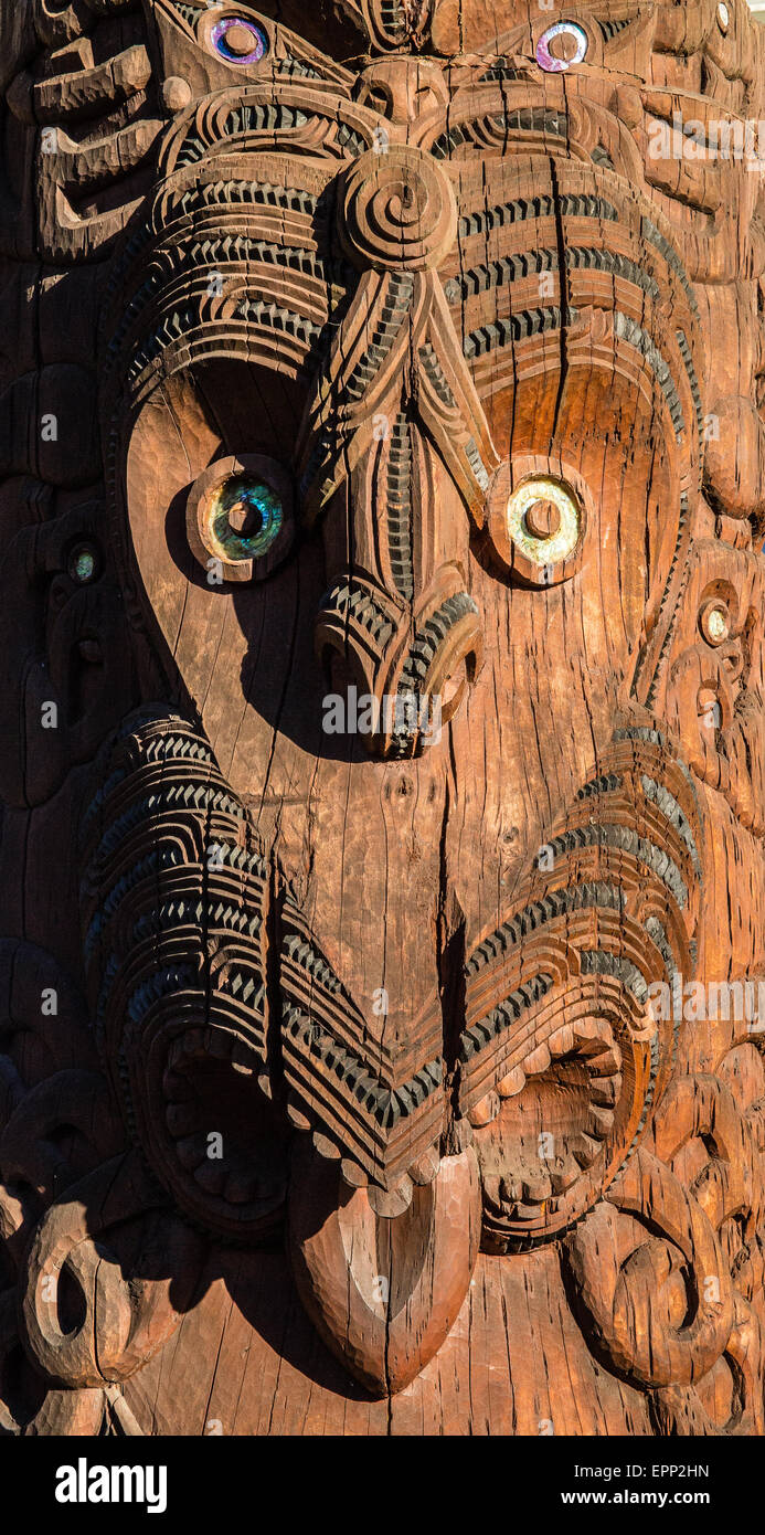 Carved wooden Maori masks at Te Puia near Rotorua in New Zealand North Island Stock Photo