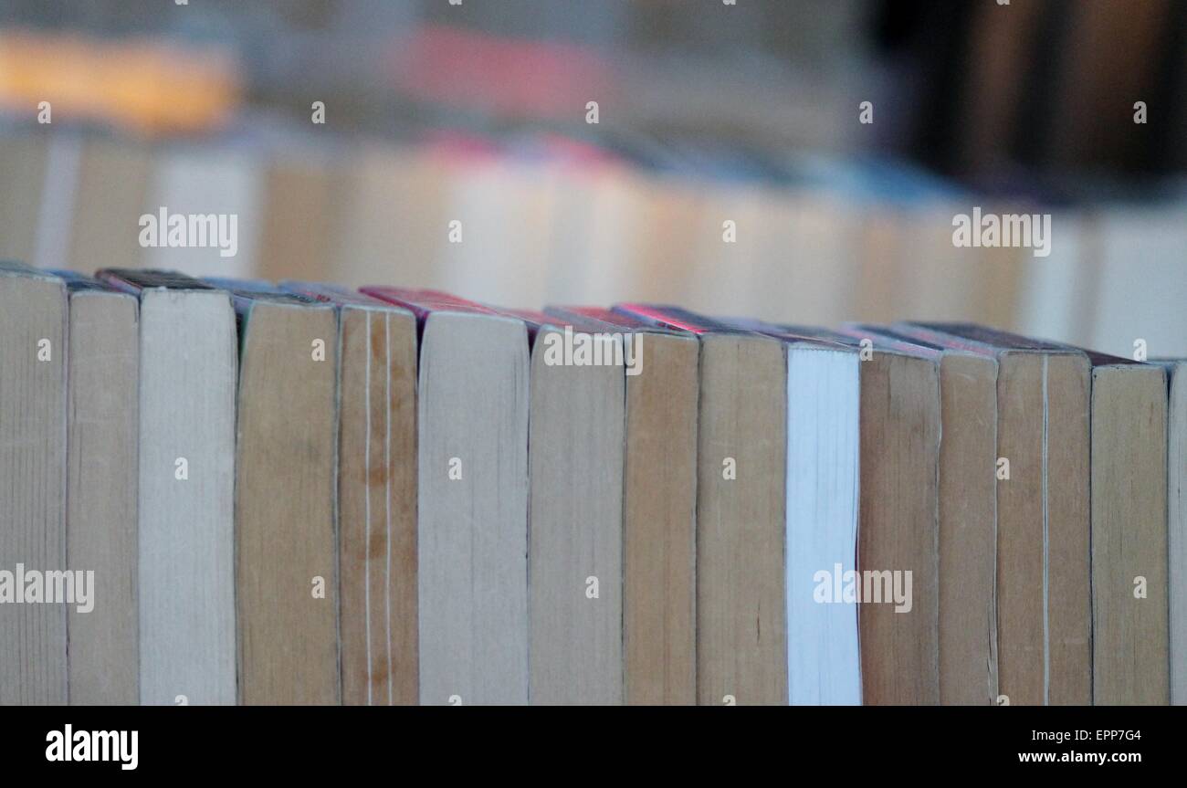 Market stall selling second hand books spine visible book, market