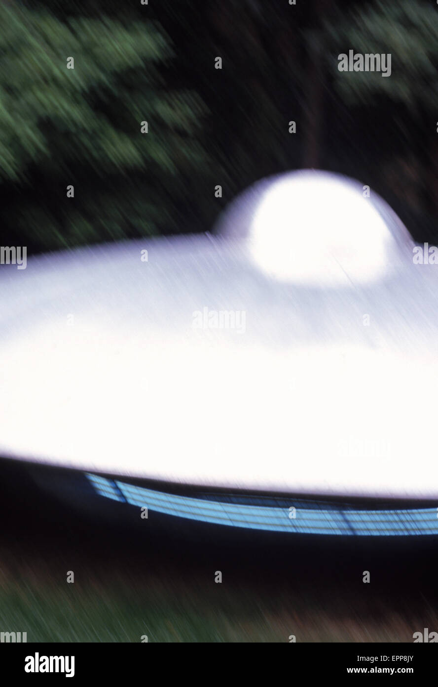 An Unidentified Flying Object spotted on the ground, USA. (motion blur) Stock Photo