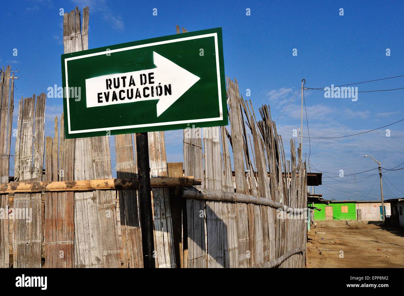 Tsunami evacuation route sign in PUERTO PIZARRO . Department of Tumbes .PERU Stock Photo