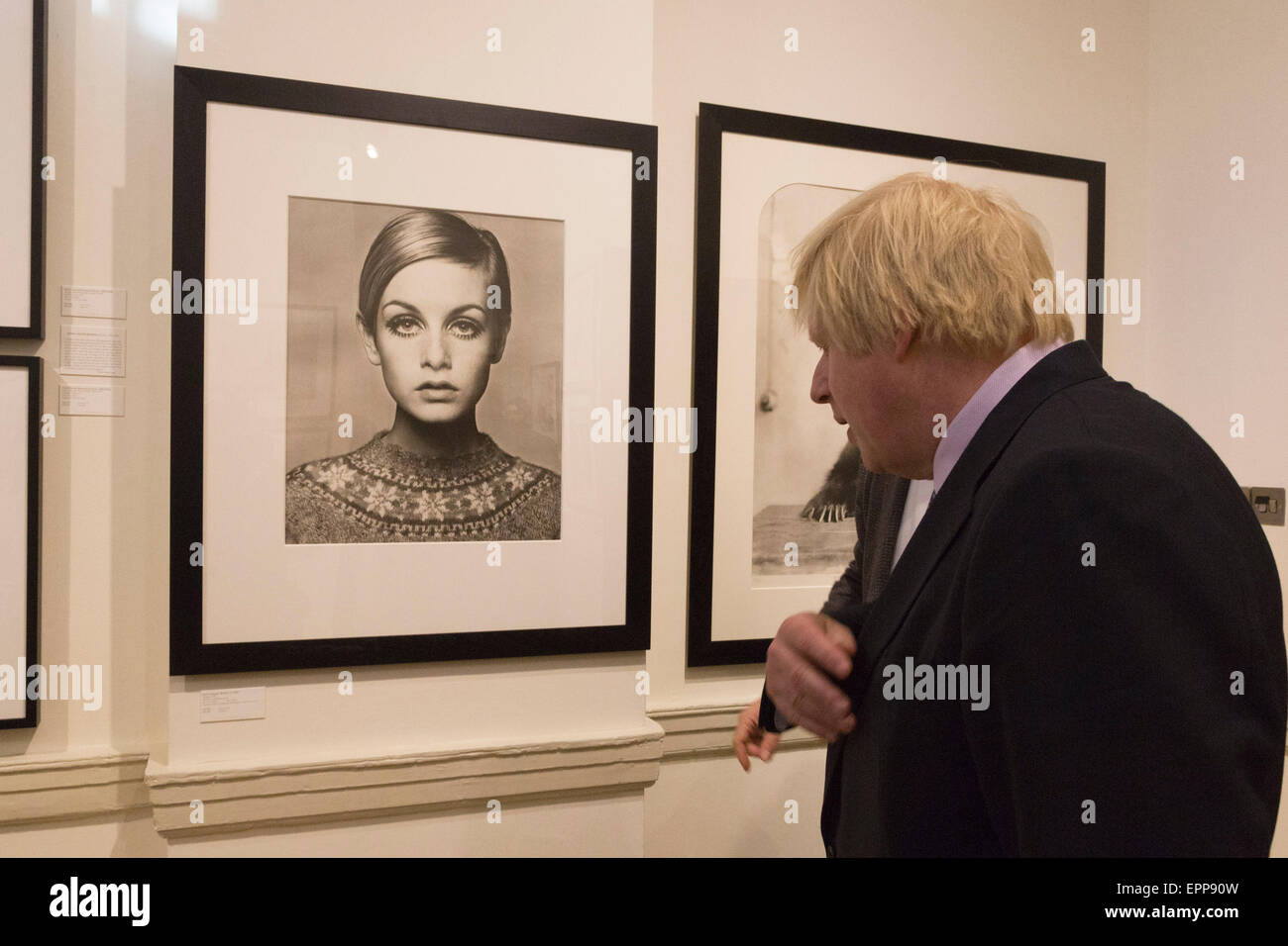 London, UK. 20 May 2015. Boris Johnson looks at a photo of Twiggy. The Mayor or London Boris Johnson formally opens the Photo London art fair at Somerset House. The fair is open to the public from 21 to 24 May 2015. Hailed as the largest and most important new photography fair ever staged in London. It brings together over 70 galleries and offers talks, screenings and performances. Photo: Bettina Strenske Stock Photo