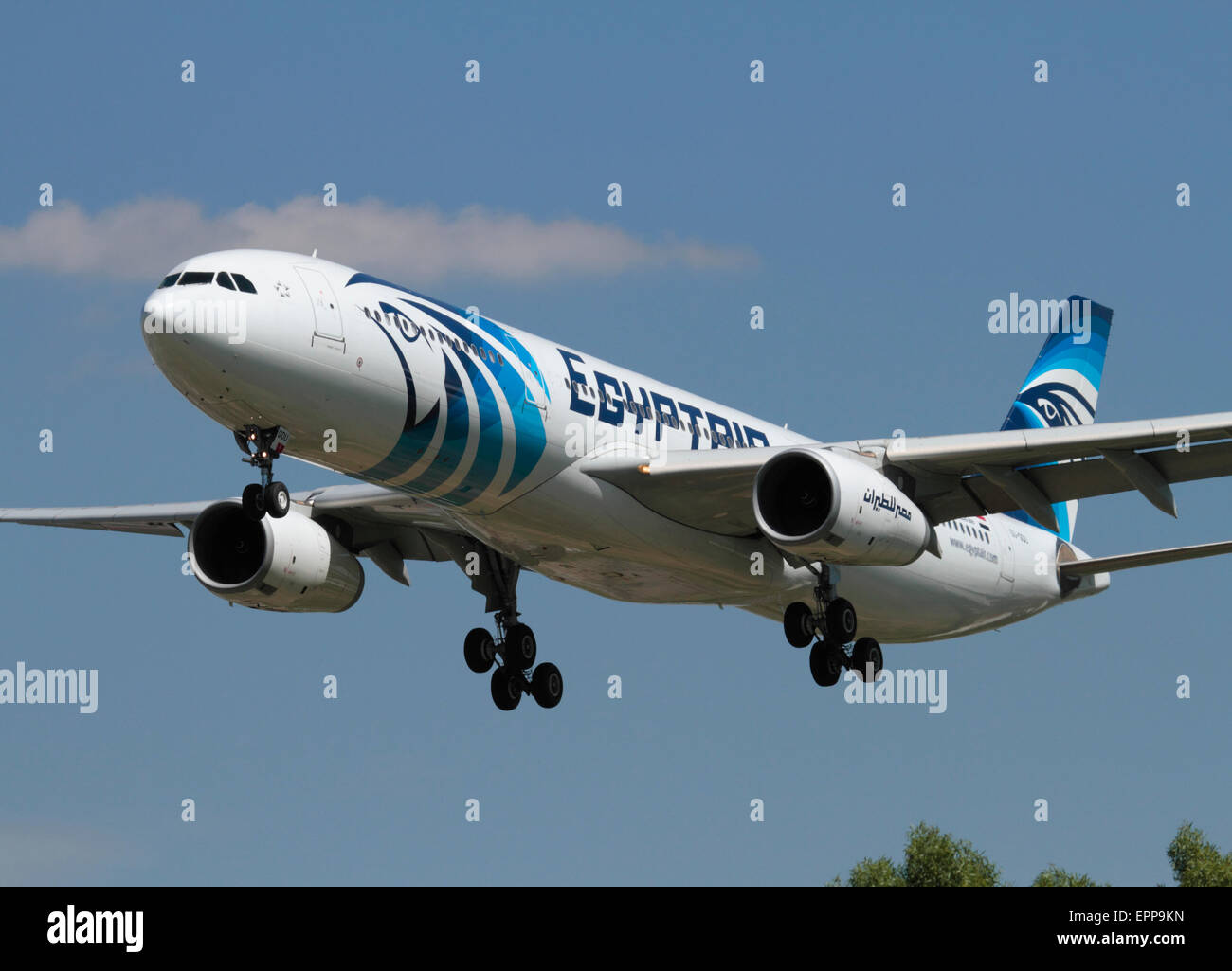 Egyptair Airbus A330-300 widebody passenger jet plane on approach to London Heathrow. Front view closeup. Stock Photo