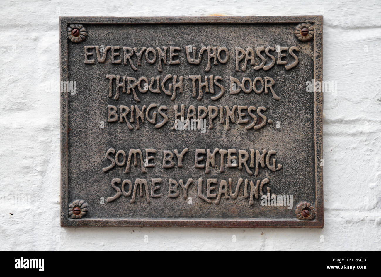 Amusing sign beside the entrance door to the Prince of Wales public ...
