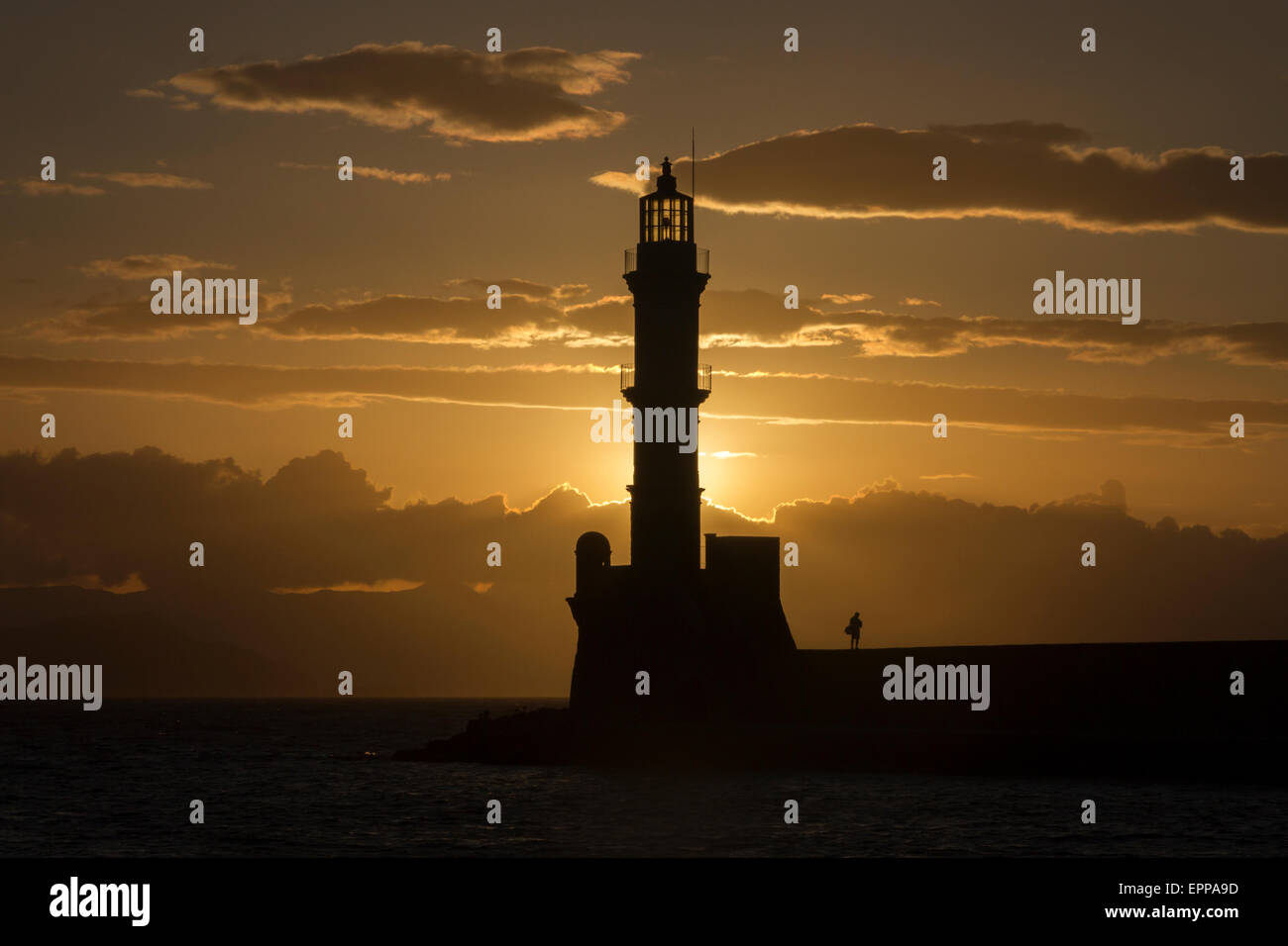 The venetian lighthouse of the old harbor at Old Town of Chania, Crete island. Stock Photo