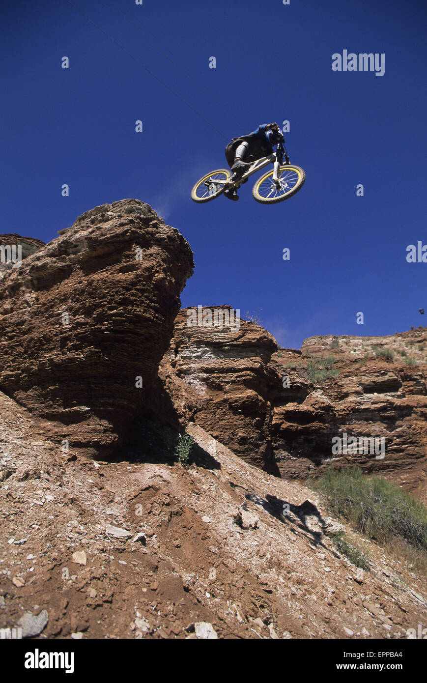 Man jumping a cliff on his mountain bike in Virgin, Utah Stock Photo Alamy