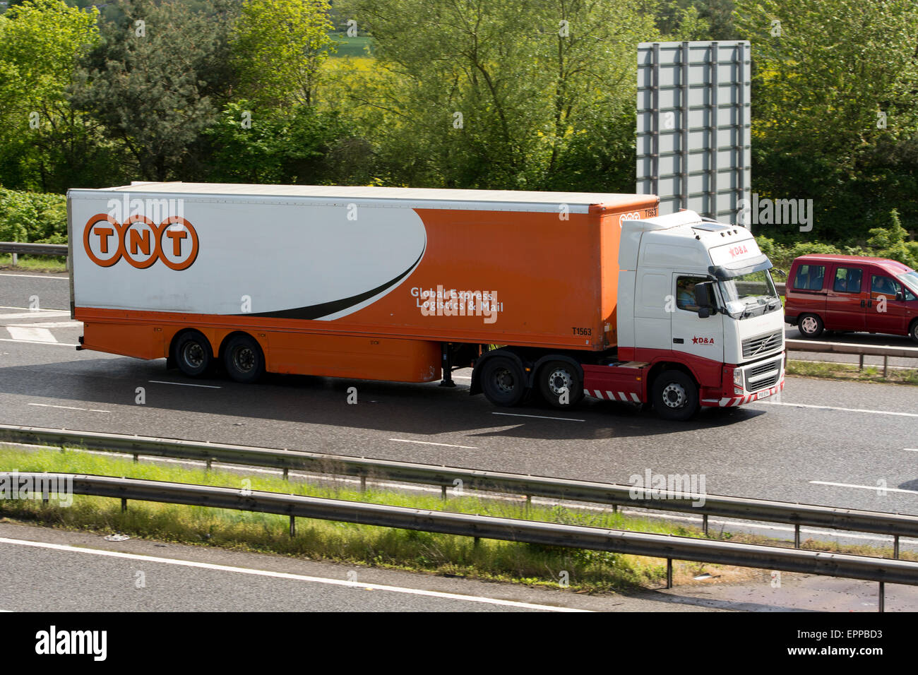 TNT lorry on M40 motorway, Warwickshire, UK Stock Photo