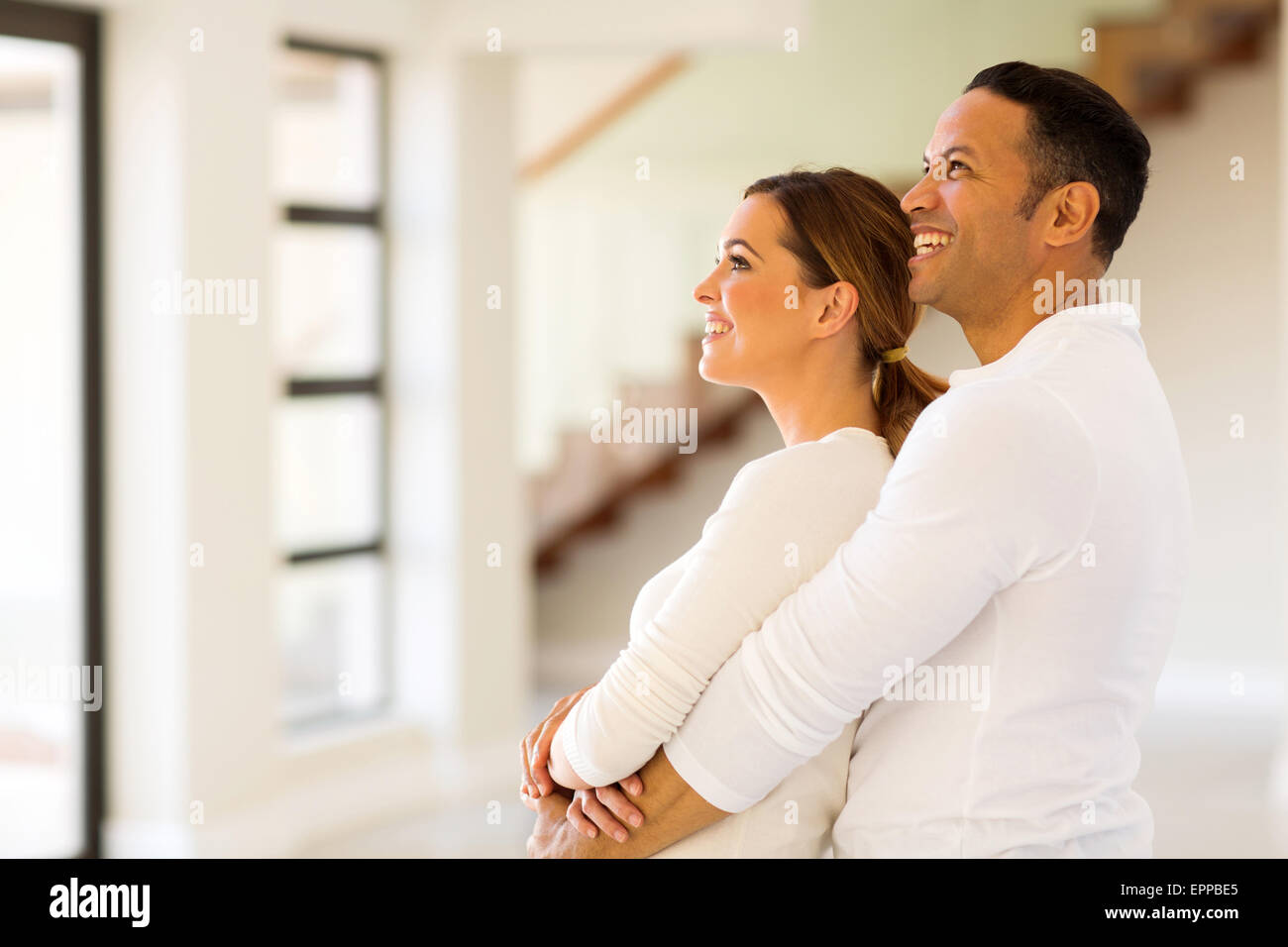 happy couple in new home Stock Photo - Alamy