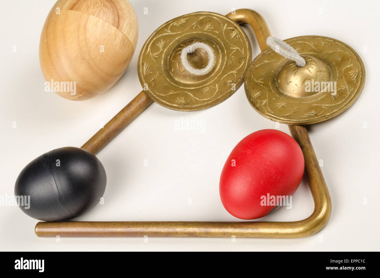 An assortment of small percussion instruments on white Stock Photo