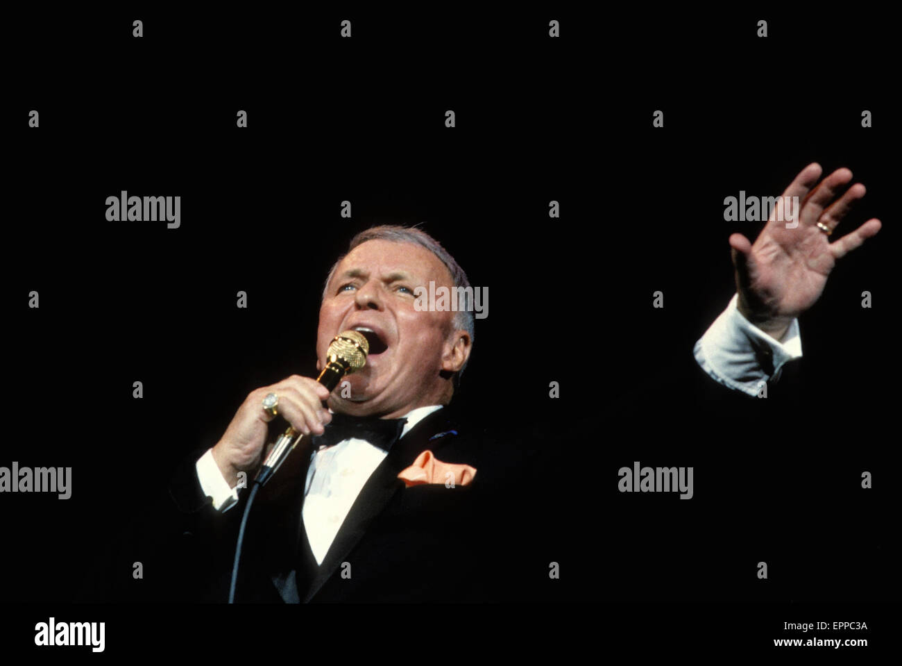 Chicago 9-10-1986 Frank Sinatra performs at the reopening of the Chicago Theater. The reopening marked the culmination of a four-year preservation effort at a cost of 18 million dollars which left the current seating capacity of the theatre at 3,600. the gala reopening was symbolic because Sinatra had performed at the theatre in the 1950's. Stock Photo