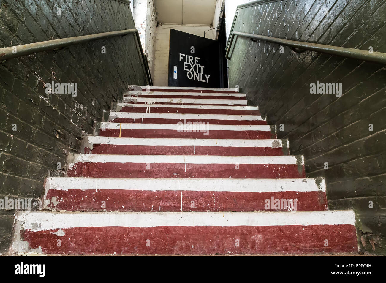 Old staircase with emergency fire exit in an old building. Stock Photo