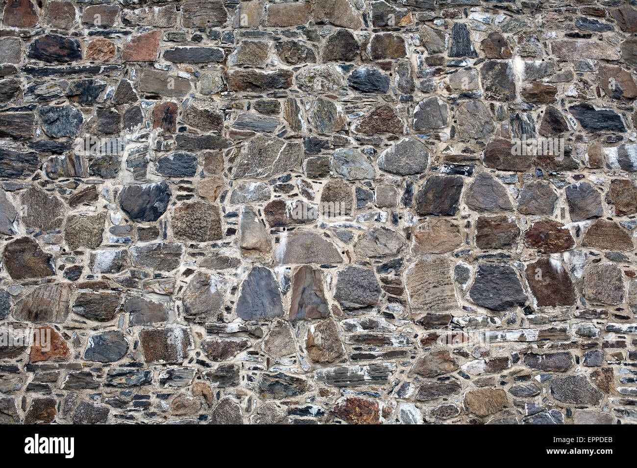 old fortress wall made from big stones masonry pattern background Stock Photo