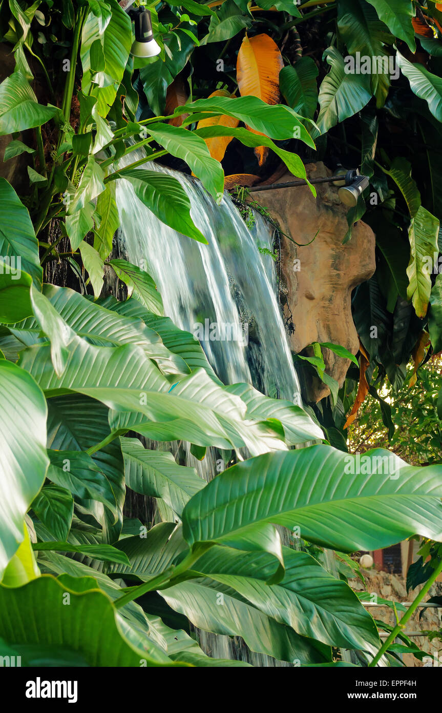 Artificial waterfall in the park Stock Photo