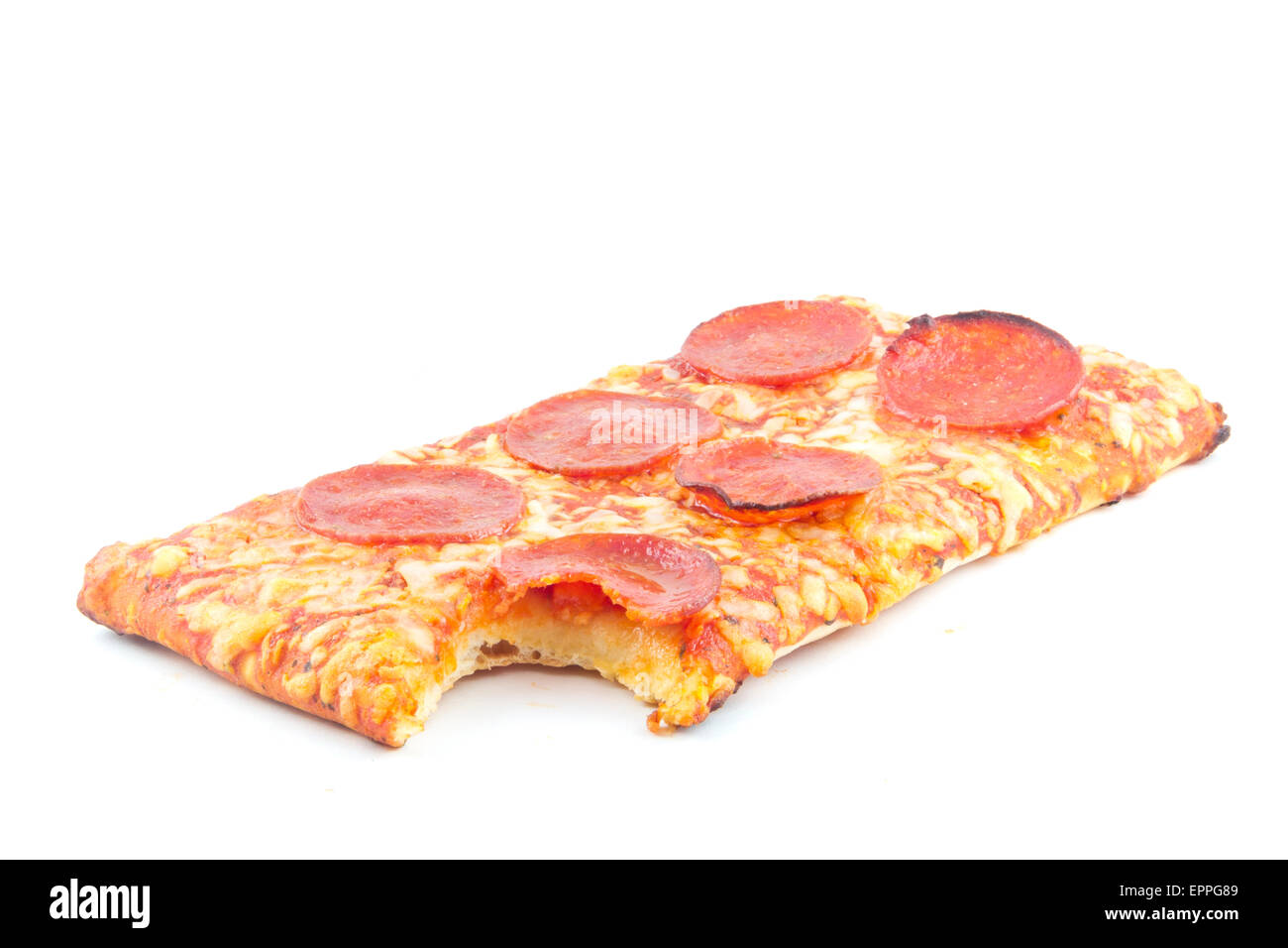 A bite taken out of an old school lunch pizza Stock Photo Alamy