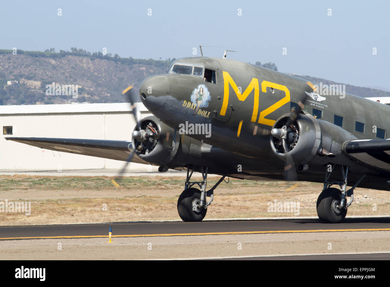 World War II C-53 troop transport pane on the runway ready to taxi Stock Photo
