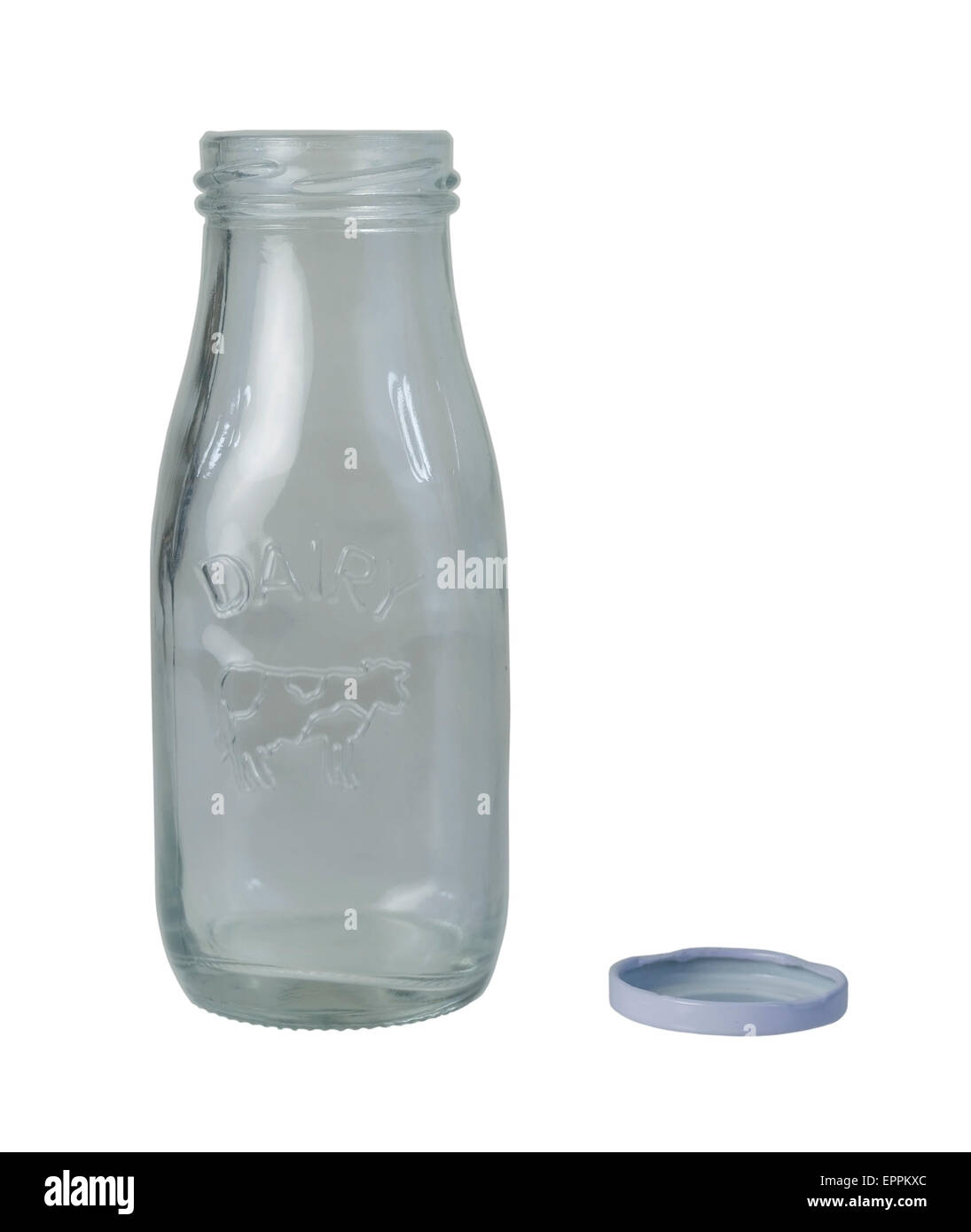 Glass dairy bottle with the outline of a cow with a metal lid - path included Stock Photo