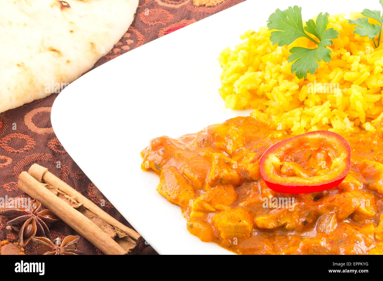 Spicy tikka masala curry chicken ready to be eaten Stock Photo - Alamy
