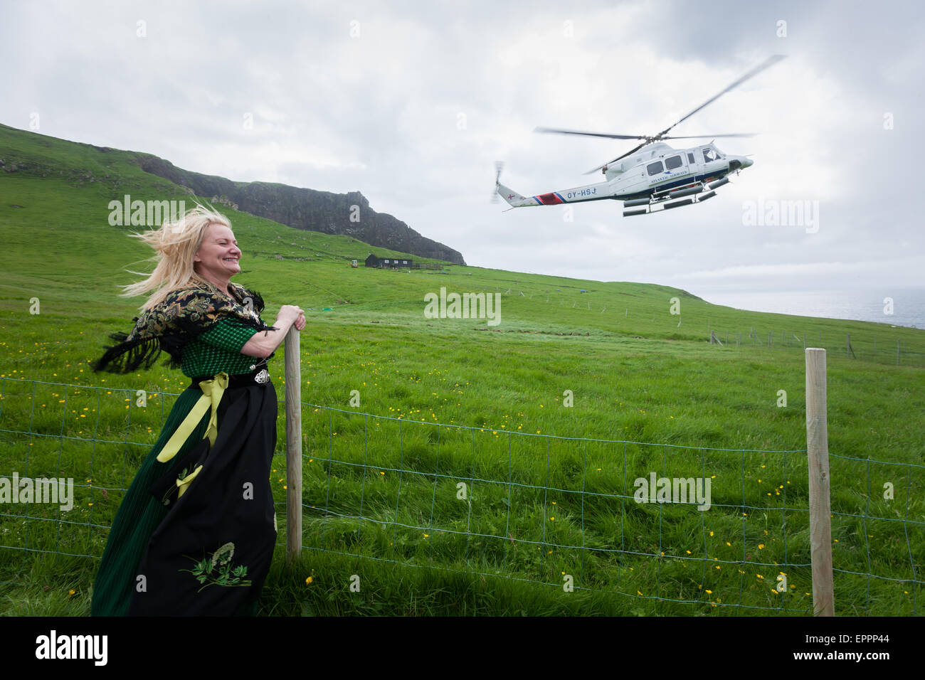 Helicopter landing in Mykines, Faroe Islands Stock Photo