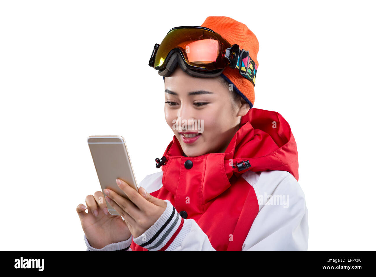 Young female skier stopping to check smartphone Stock Photo Alamy