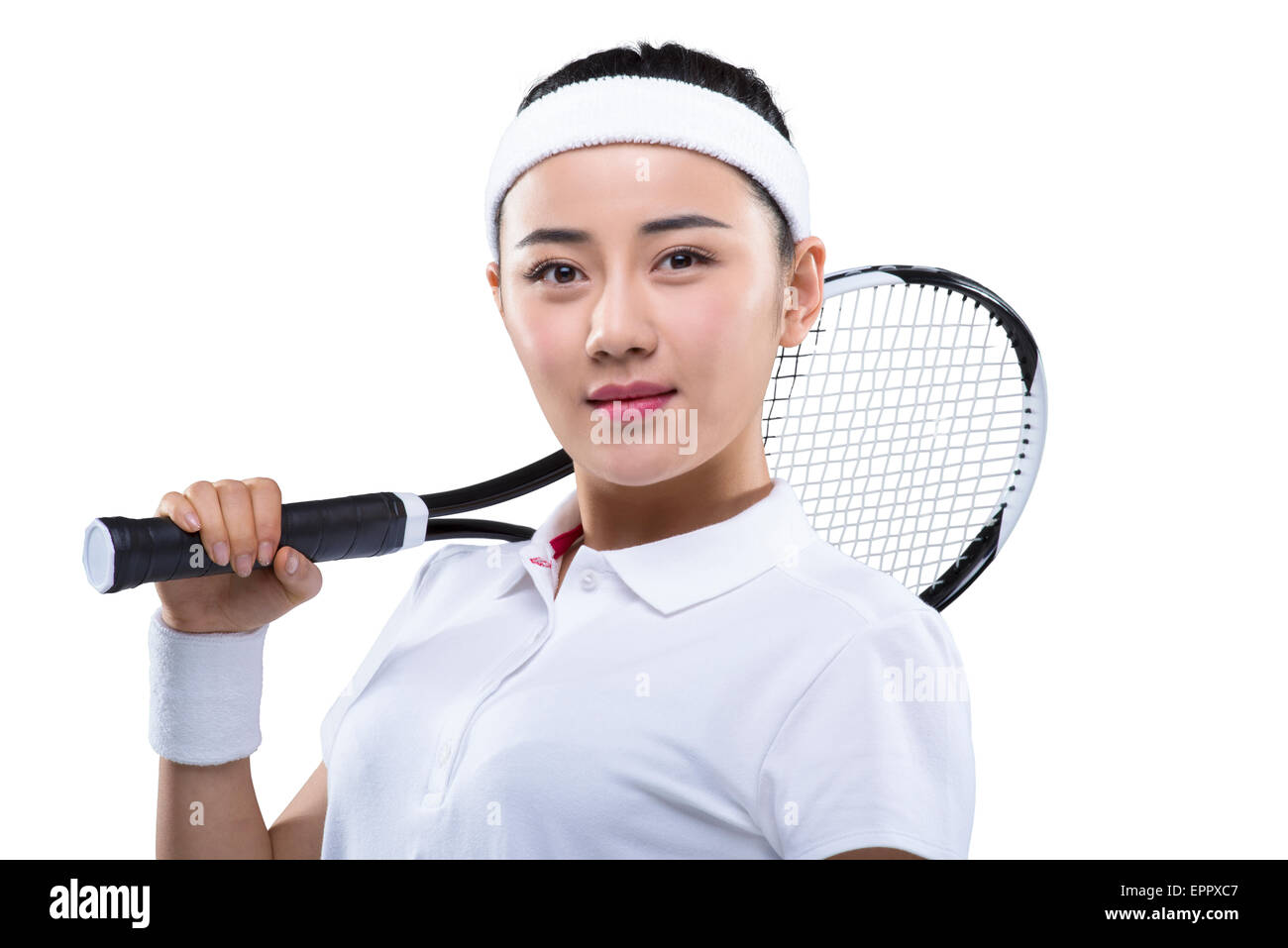 Young female tennis player with tennis racket on shoulder Stock Photo Alamy