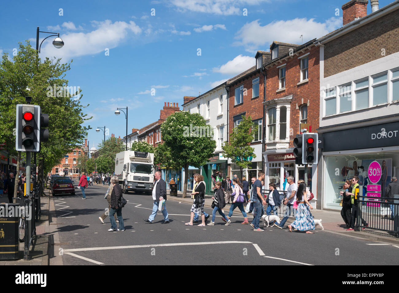 People crossing  Lumley Road, Skegness town centre, Lincolnshire, England, UK Stock Photo