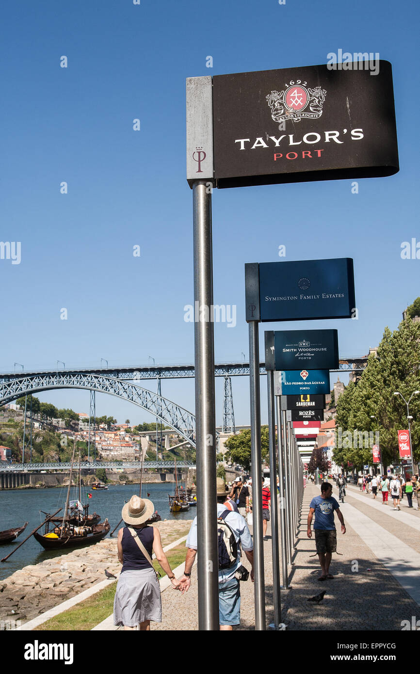 Signs for the Port wine companies that have wine cellars in Porto. The