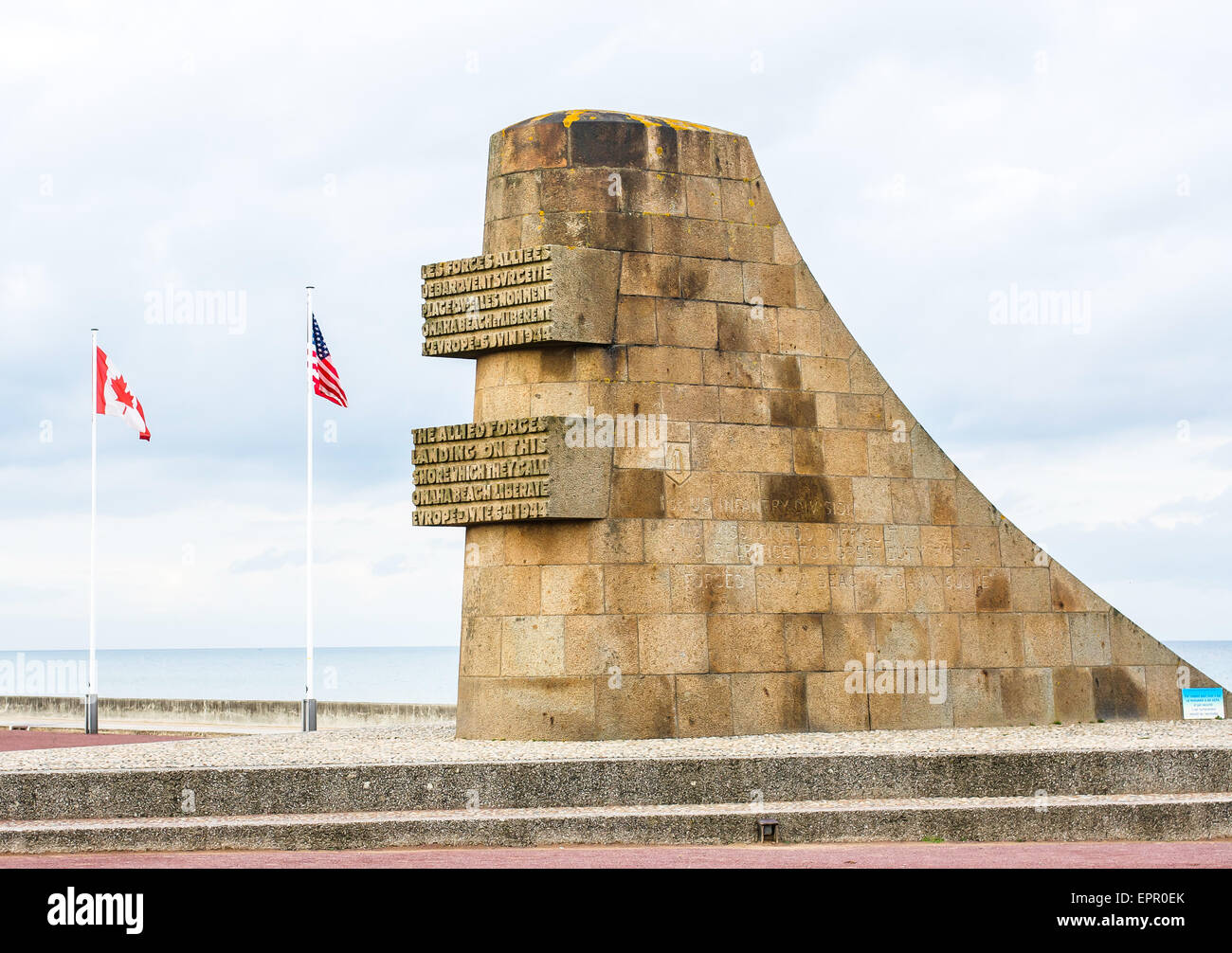 A large stone monument on Omaha Beach, Normandy, France commemorates one of the most important sites of the 6th June 1944 D-Day. Stock Photo