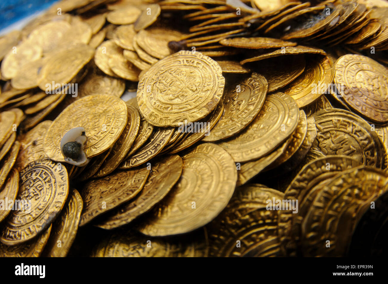 Scuba Divers uncover a hoard of 2000 gold coins from the Fatimid period (eleventh century CE) in the ancient harbour of Caesarea Stock Photo
