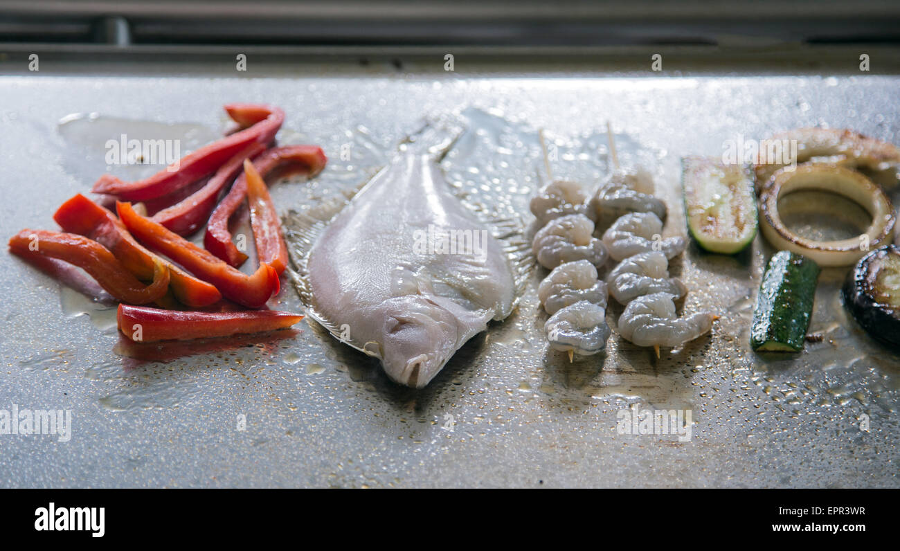 restaurant cuisine with grilled foods and a sole fish Stock Photo Alamy